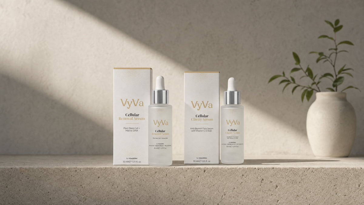 Cellular Renewal and Cellular Clarity serums with their cartons on stone